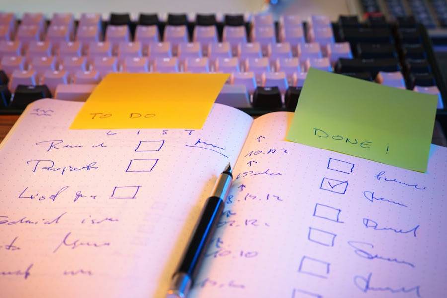 Notebook, sticky notes, and desk materials used for field notes about clinical research participation.